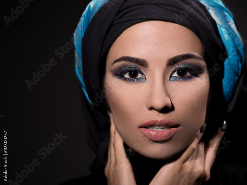 Beautiful and stylish girl of Arab appearance, Arabic makeup,Beautiful young woman with perfect clean shiny skin. black