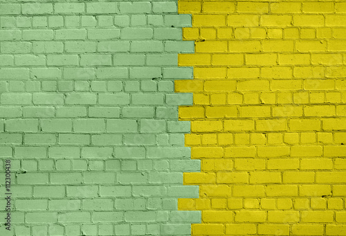 Light Green and Yellow Brick Wall