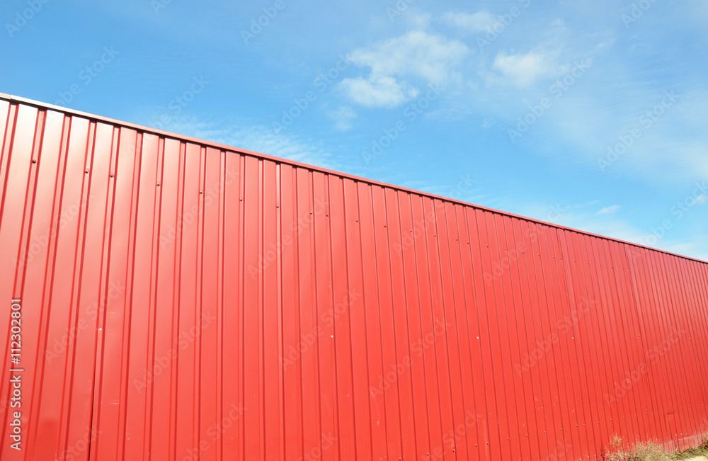 Fototapeta premium New Red Profile Metal Fence