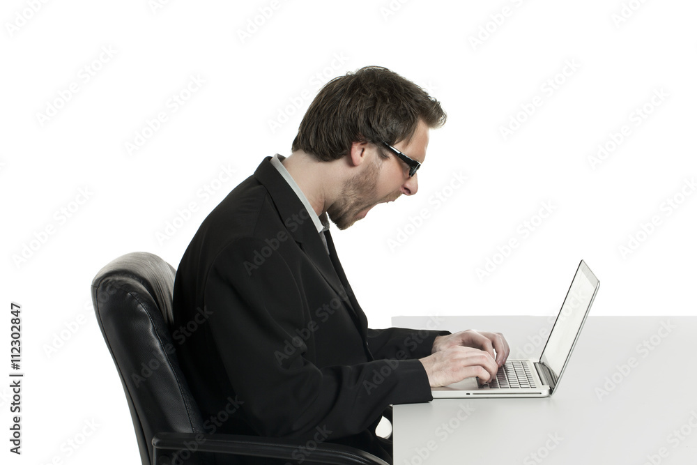 a yelling businessman on his laptop a yelling businessman on his laptop