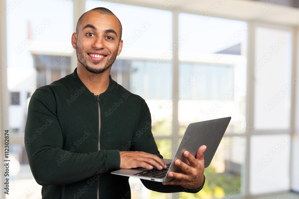 black business man with laptop black business man with laptop