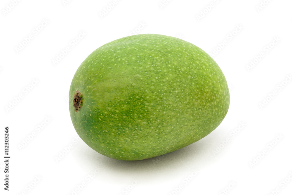 An Organic green Indian Mango (Mangifera indica) isolated on white background. Front view. An Organic green Indian Mango (Mangifera indica) isolated on white background. Front view.