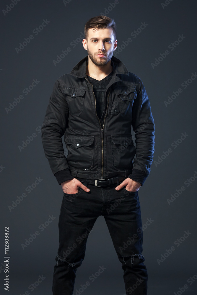 Portrait of cool looking handsome young man in casual wear. Portrait of cool looking handsome young man in casual wear.
