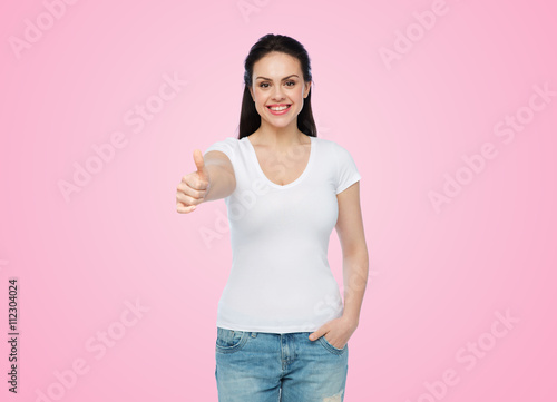 happy womanin white t-shirt showing thumbs up