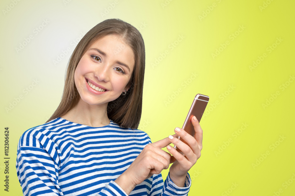 Beautiful woman texting on her cell phone Beautiful woman texting on her cell phone