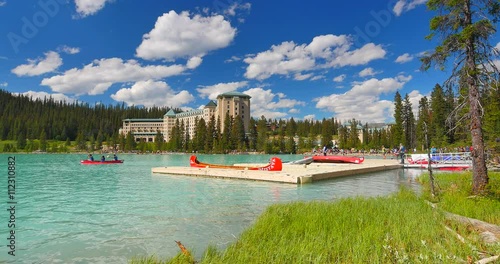 4K Beautiful Lake Louise and Canoe Paddlers on Summer Day