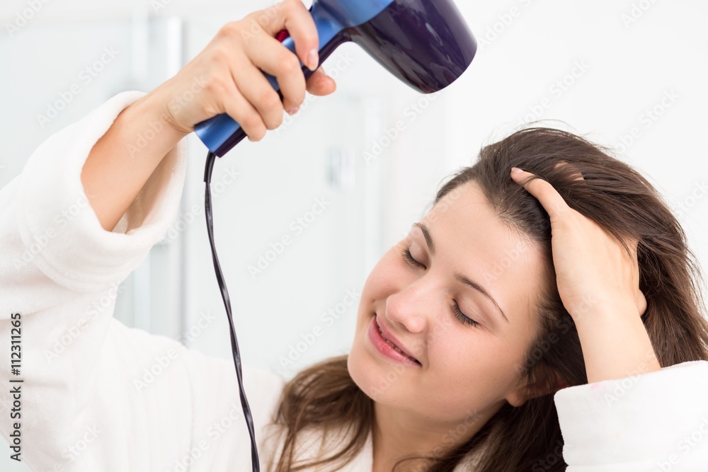 Woman with hairdryer Woman with hairdryer