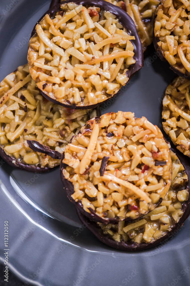 Homemade florentines cakes with chocolate Homemade florentines cakes with chocolate
