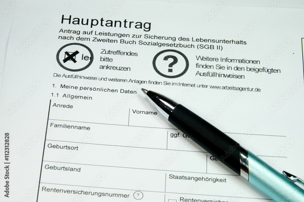 Antrag auf Arbeitslosenunterstützung und ein Kugelschreiber Antrag auf Arbeitslosenunterstützung und ein Kugelschreiber