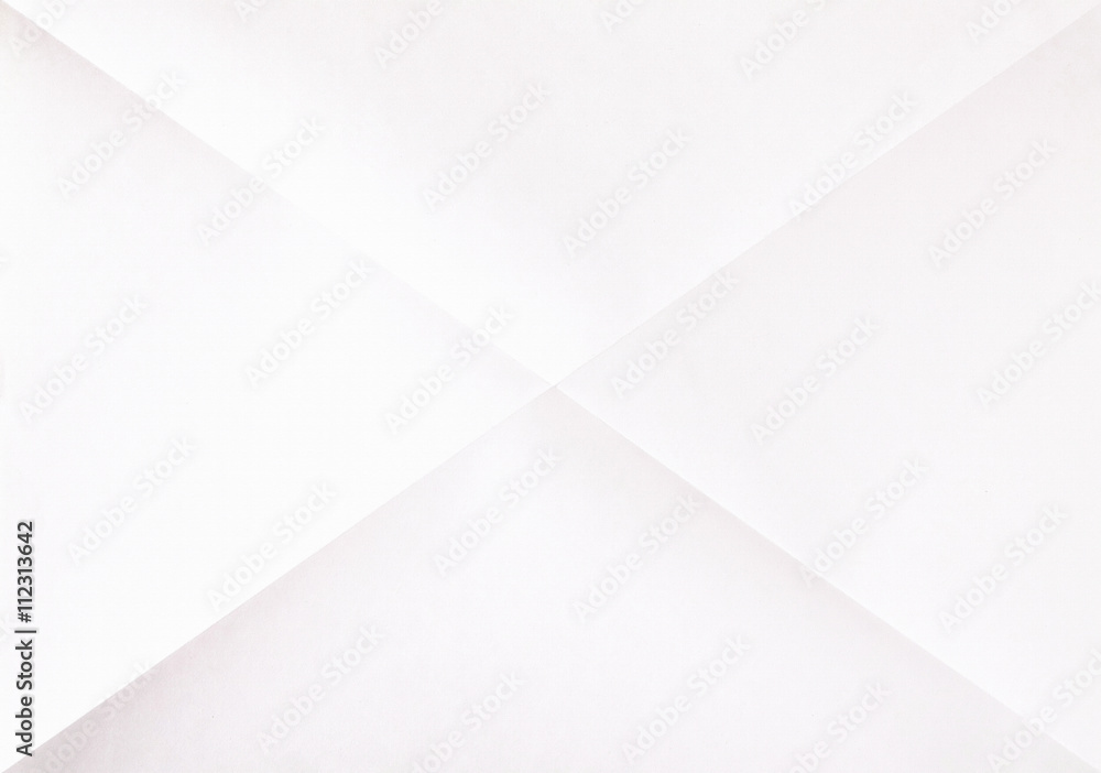white sheet of folded paper white sheet of folded paper
