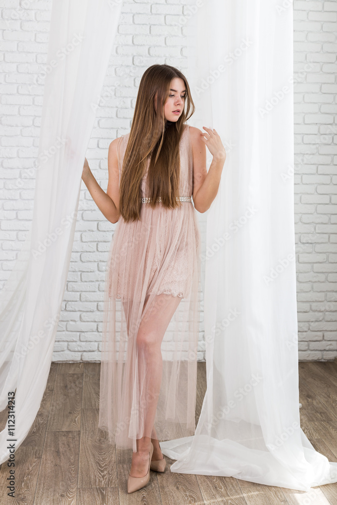 Fashion studio portrait of beautiful young fair hair woman Fashion studio portrait of beautiful young fair hair woman