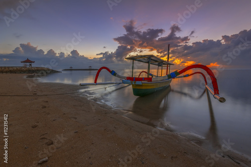 Wallpaper Mural Traditional Balinese ships Jukung at Sanur beach during sunrise, Bali, Indonesia Torontodigital.ca