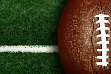 American football on football field background