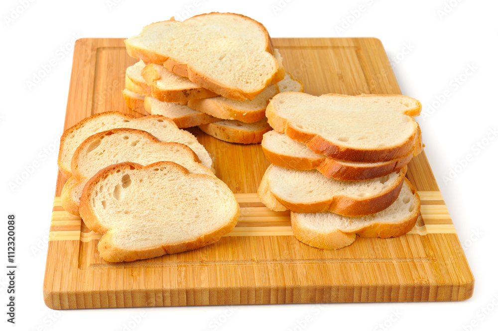 cut bread on breadboard cut bread on breadboard