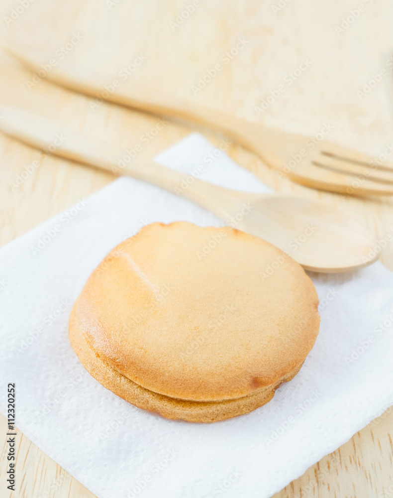 custard cake on wood table custard cake on wood table