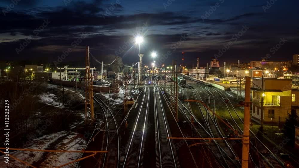 Trains arrive and depart at the railway station at sunset, timelapse
Trains arrive and depart at the railway station at sunset, timelapse