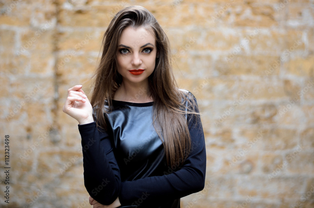 portrait of model posing outdoors in black leather clothes portrait of model posing outdoors in black leather clothes