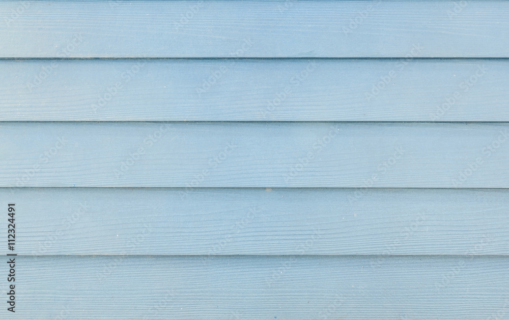 Closeup surface blue painted wood board at the wall texture background Closeup surface blue painted wood board at the wall texture background
