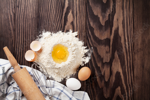 Kitchen table with utensils and ingredients