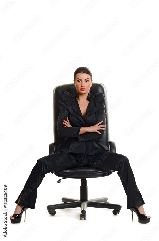 Young business woman joining two jigsaw puzzle pieces Young business woman joining two jigsaw puzzle pieces