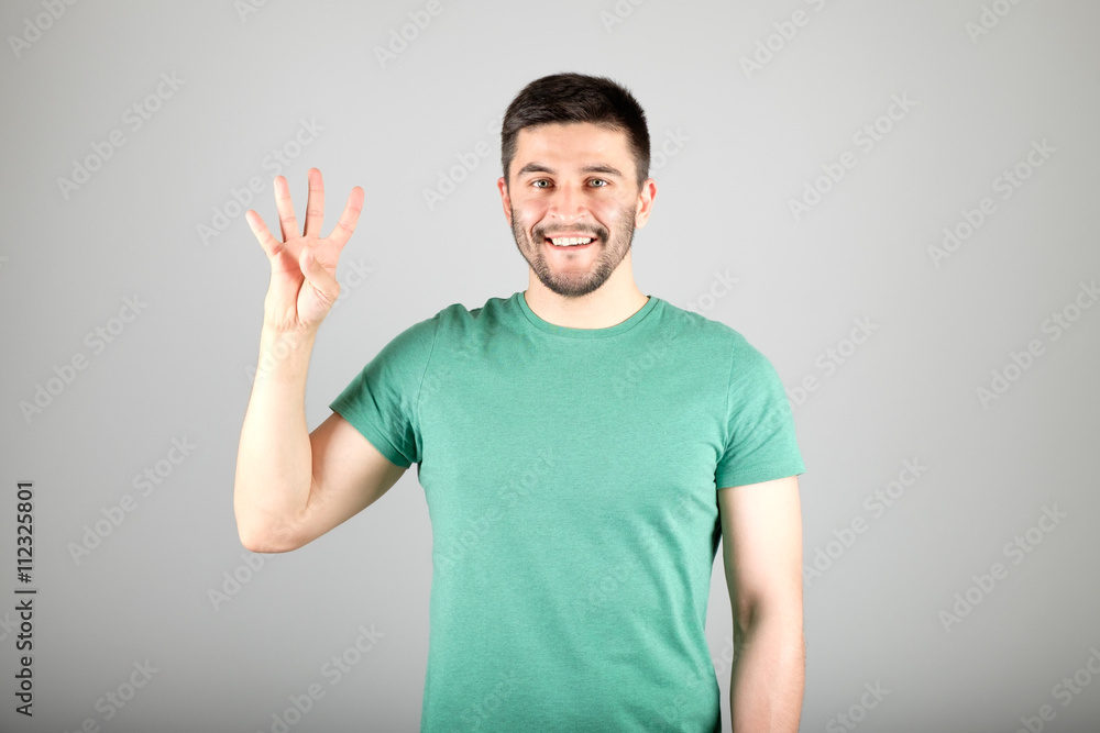 Man showing number by fingers Man showing number by fingers