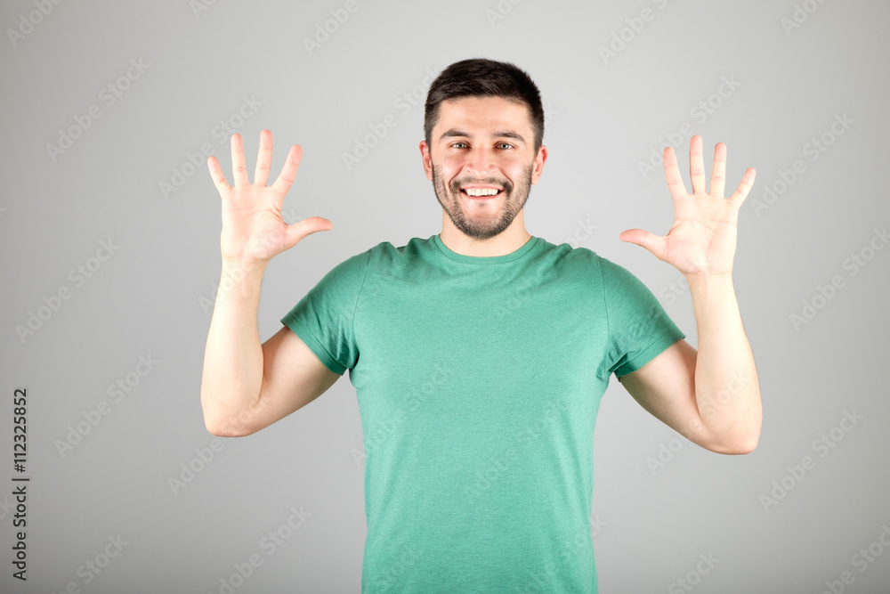 Man showing number by fingers Man showing number by fingers