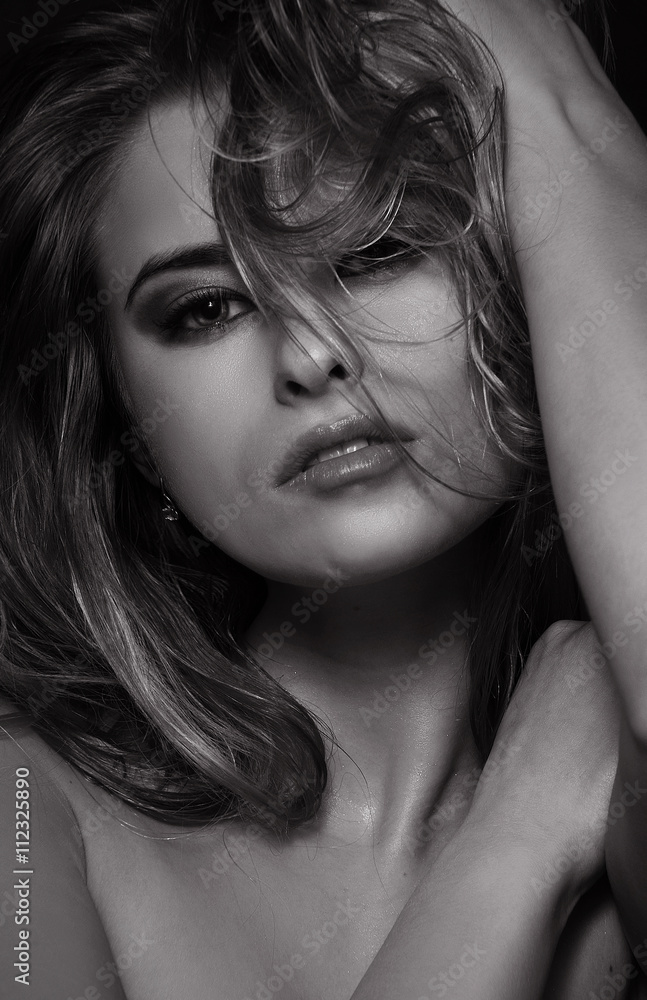 Beautiful face of young adult woman with clean fresh skin and wet hair Beautiful face of young adult woman with clean fresh skin and wet hair