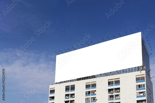 the white background  bill board building on the apatment building with the sky photo