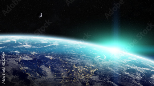 Fototapeta Naklejka Na Ścianę i Meble -  Sunrise over planet Earth in space