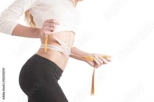 Foto Young woman with scales