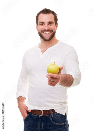 Handsome man with green apple