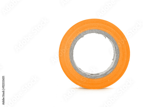 Protecting sticky orange insulating tape coil isolated on white background