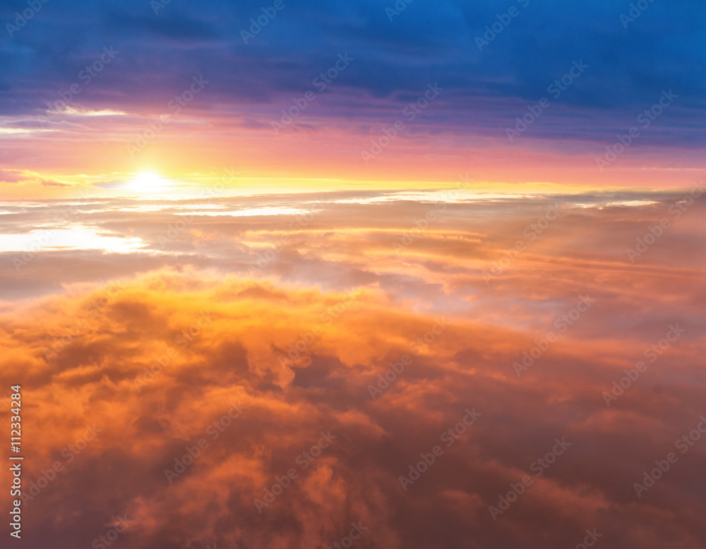 Beautiful sunset above clouds
