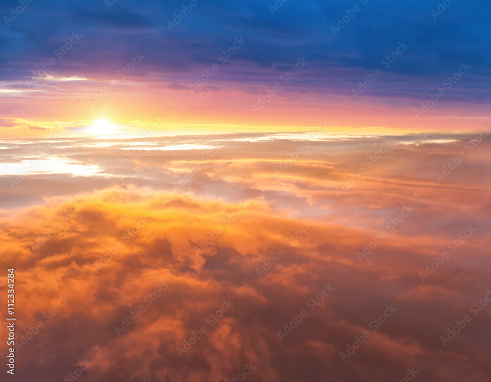 Beautiful sunset above clouds Beautiful sunset above clouds