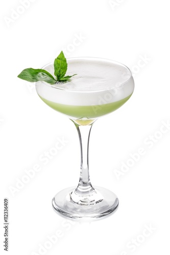 Basil Sour cocktail decorated with mint leaves