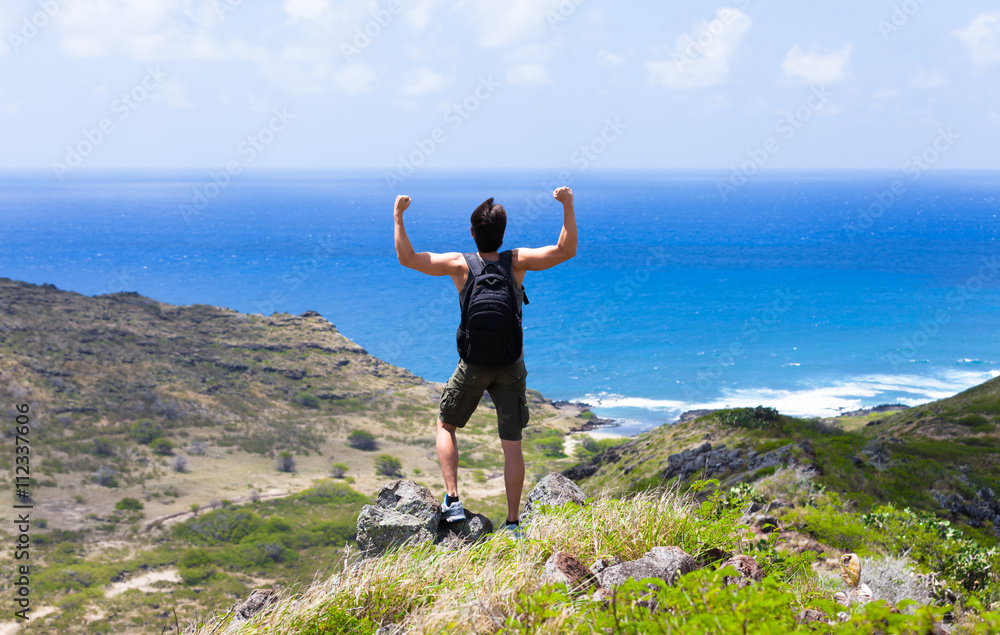 Male hiker on the edge of a cliff celebrating. (winning concept)
Male hiker on the edge of a cliff celebrating. (winning concept)