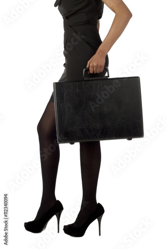 businesswoman holding suitcase