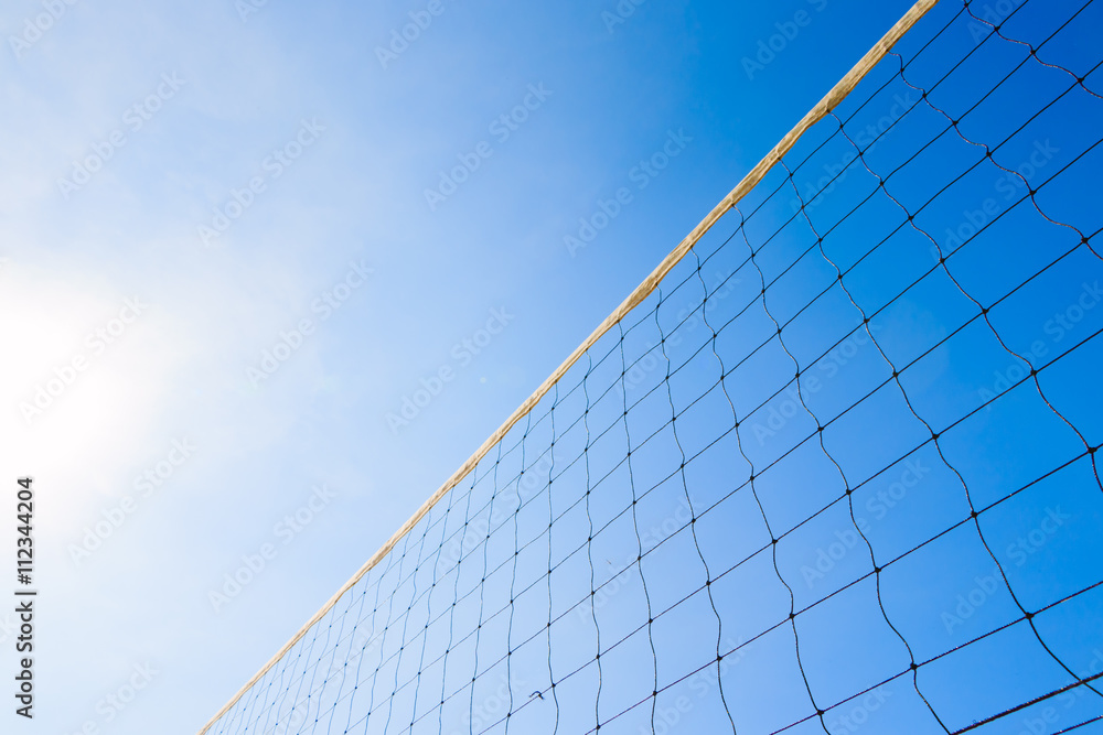 Volleyball net with blue sky for background design Volleyball net with blue sky for background design