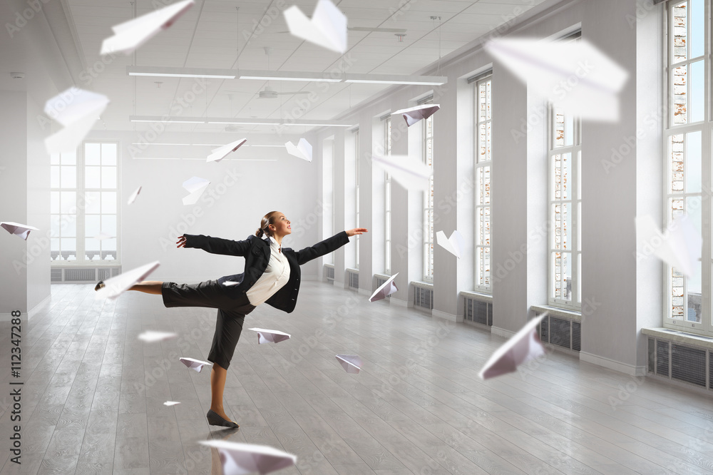 Dancing businesswoman in office Dancing businesswoman in office