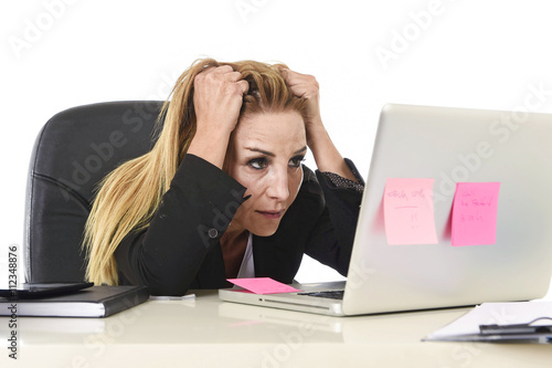 worried attractive businesswoman in stress working with laptop c