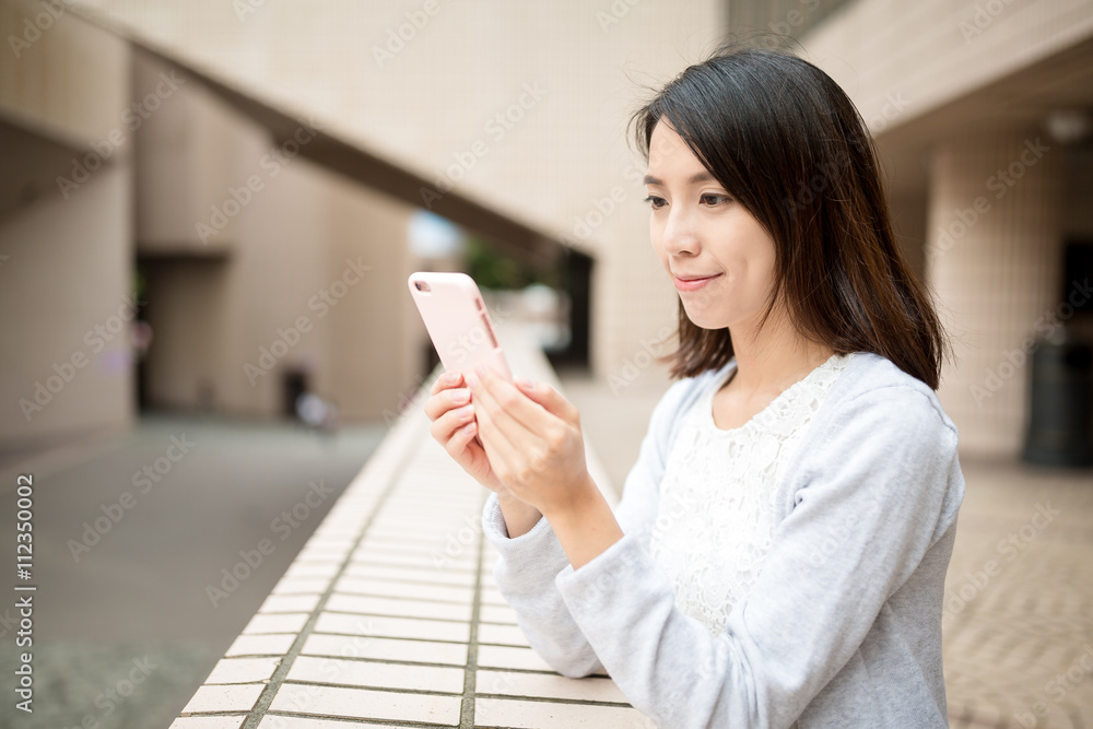 Fototapeta premium Woman use of mobile phone