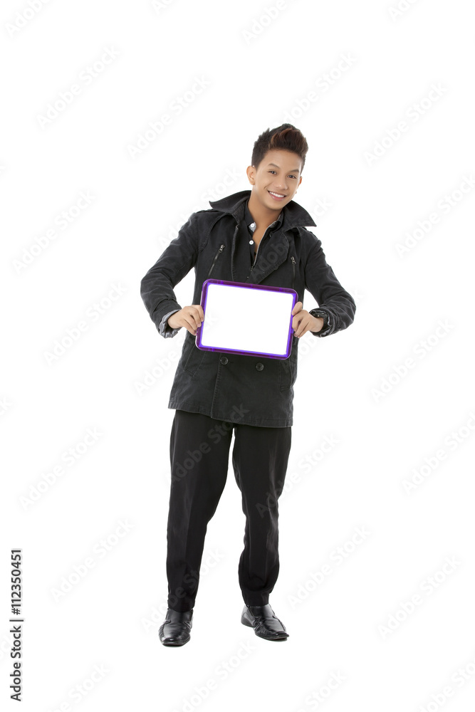 man in a black suit holding a slate board man in a black suit holding a slate board