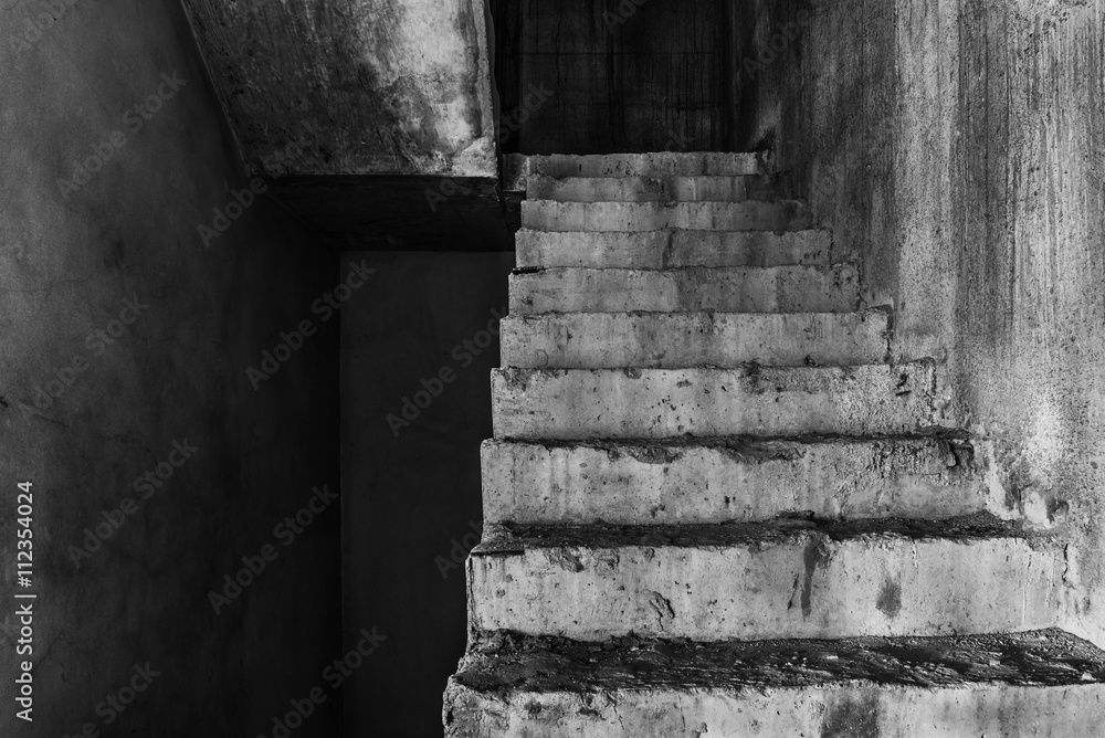 Stair in abandoned building, darkness horror and halloween background concept Stair in abandoned building, darkness horror and halloween background concept