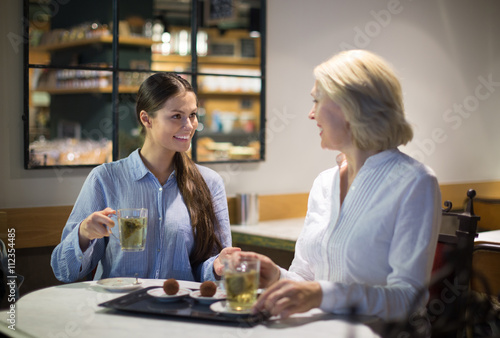 female friends talking at cafe