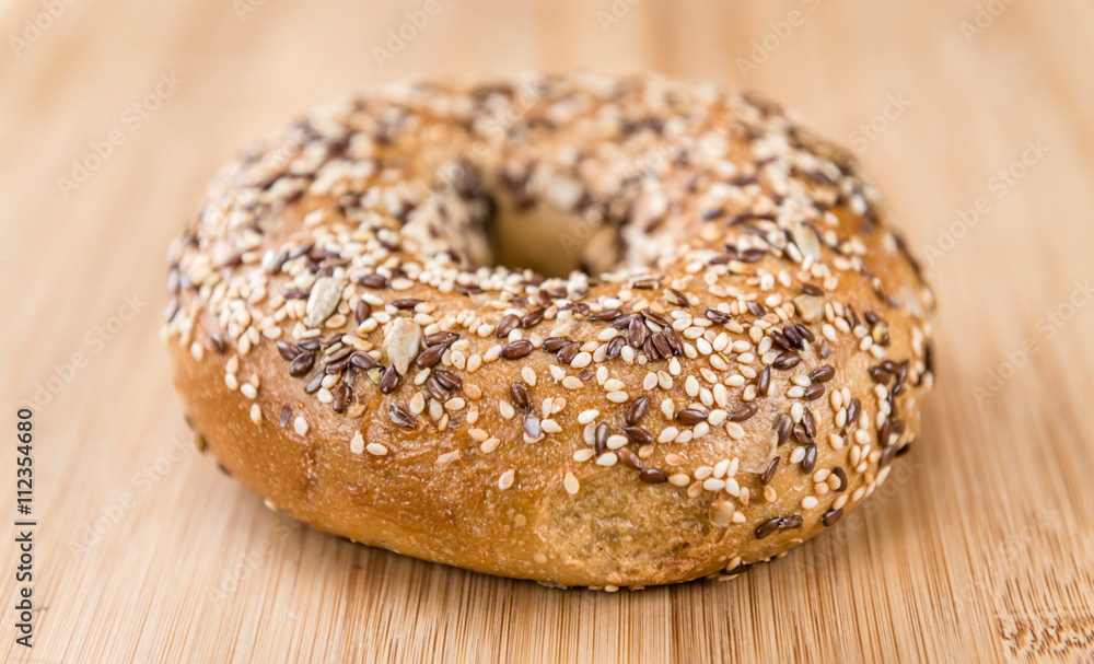 Wholemeal Bagels on wooden background Wholemeal Bagels on wooden background