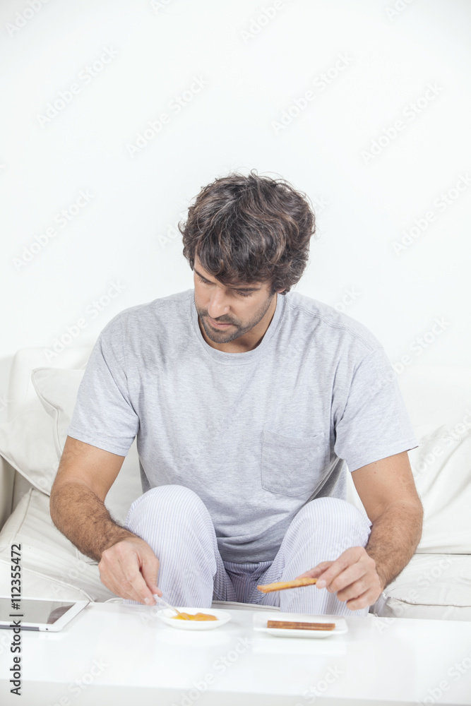 Man working on laptop and talking on phone Man working on laptop and talking on phone