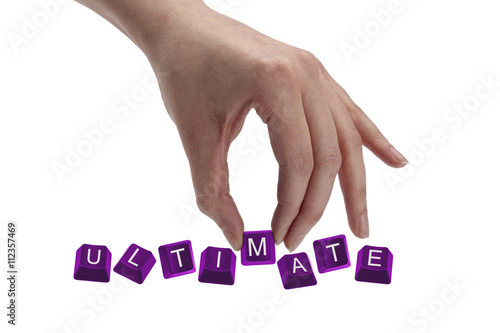 keys spelling the word ultimate