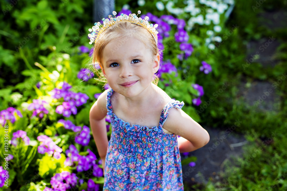 Summer girl on the nature in a sundress and hat Summer girl on the nature in a sundress and hat