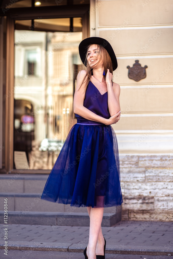 City walk - fashion street photo session of stylish young lady