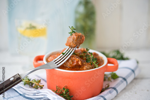 Quenelles in tomato sauce  